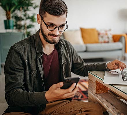 man looking at phone