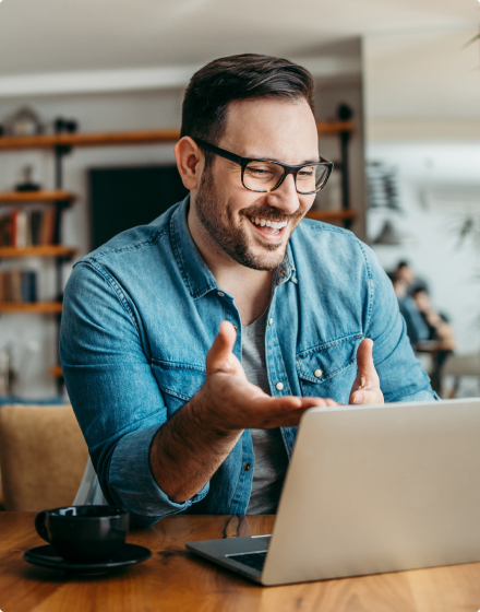 Man using laptop at home.