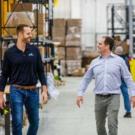 men in warehouse